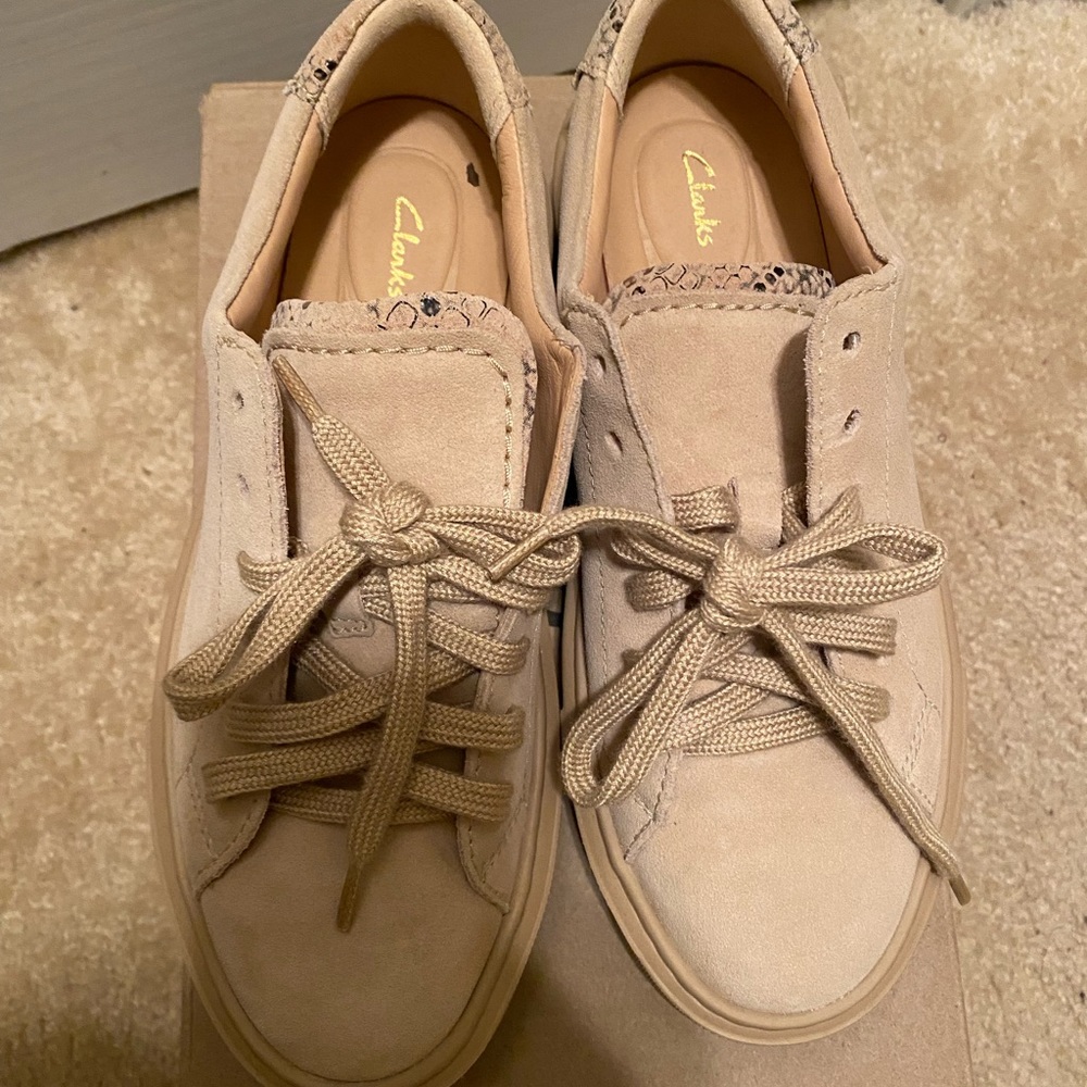 Tan Clark’s size 7.5